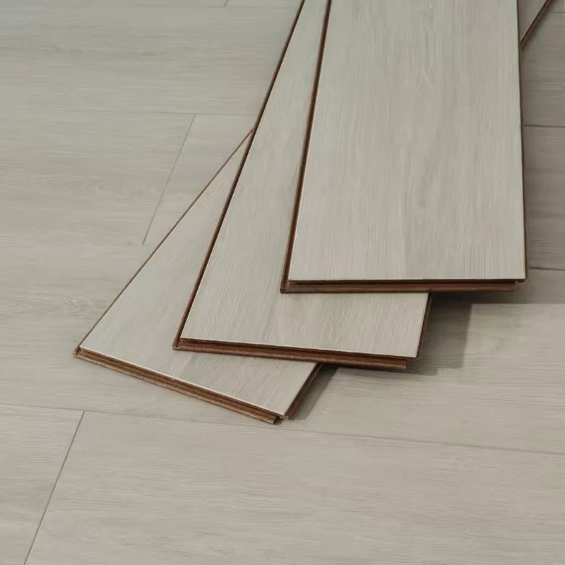 Durable 12mm Laminate Flooring Waterproof Fire Retardant Grey Laminate Wood Flooring Easy to Clean Light Gray Laminate Flooring