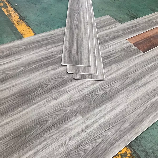 High quality Scratch resistant Waterproof and Quiet Luxury SPC Plastic Flooring with Stone Composite Design